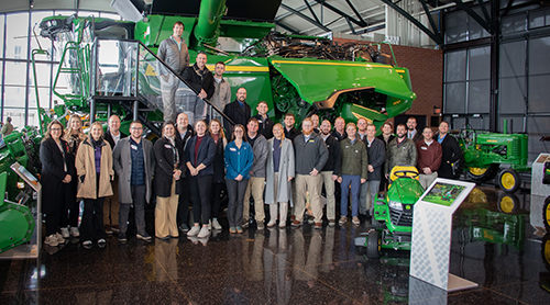 LEAD group in surrounded by ag equipment