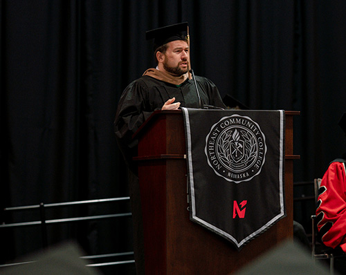 commencement speaker at podium