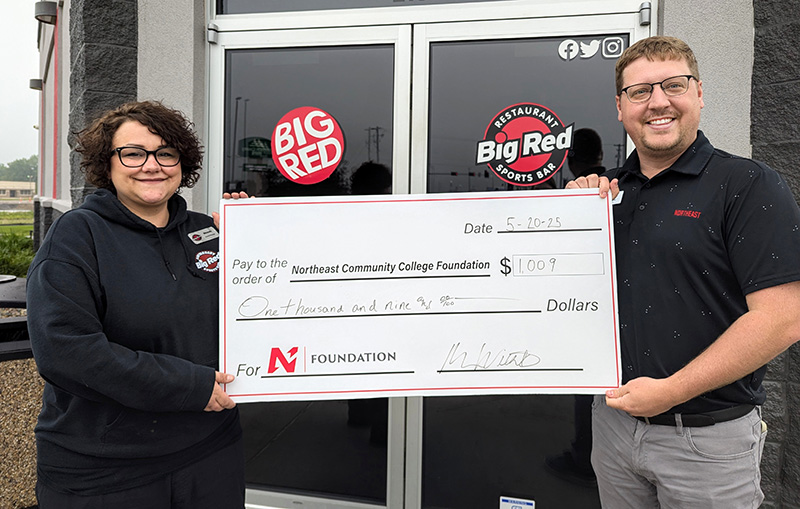 check presentation from Big Red sports bar to Northeast Community College