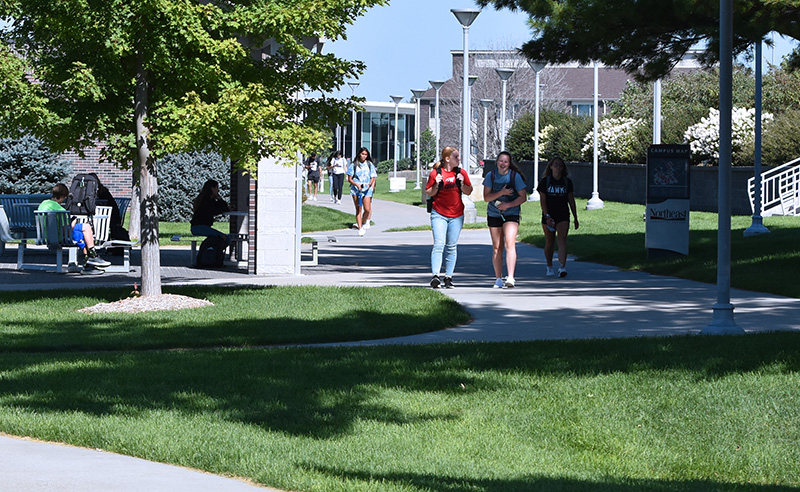 students walking on campus