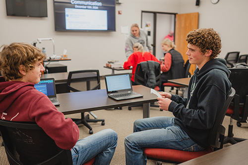 Students interacting in classroom