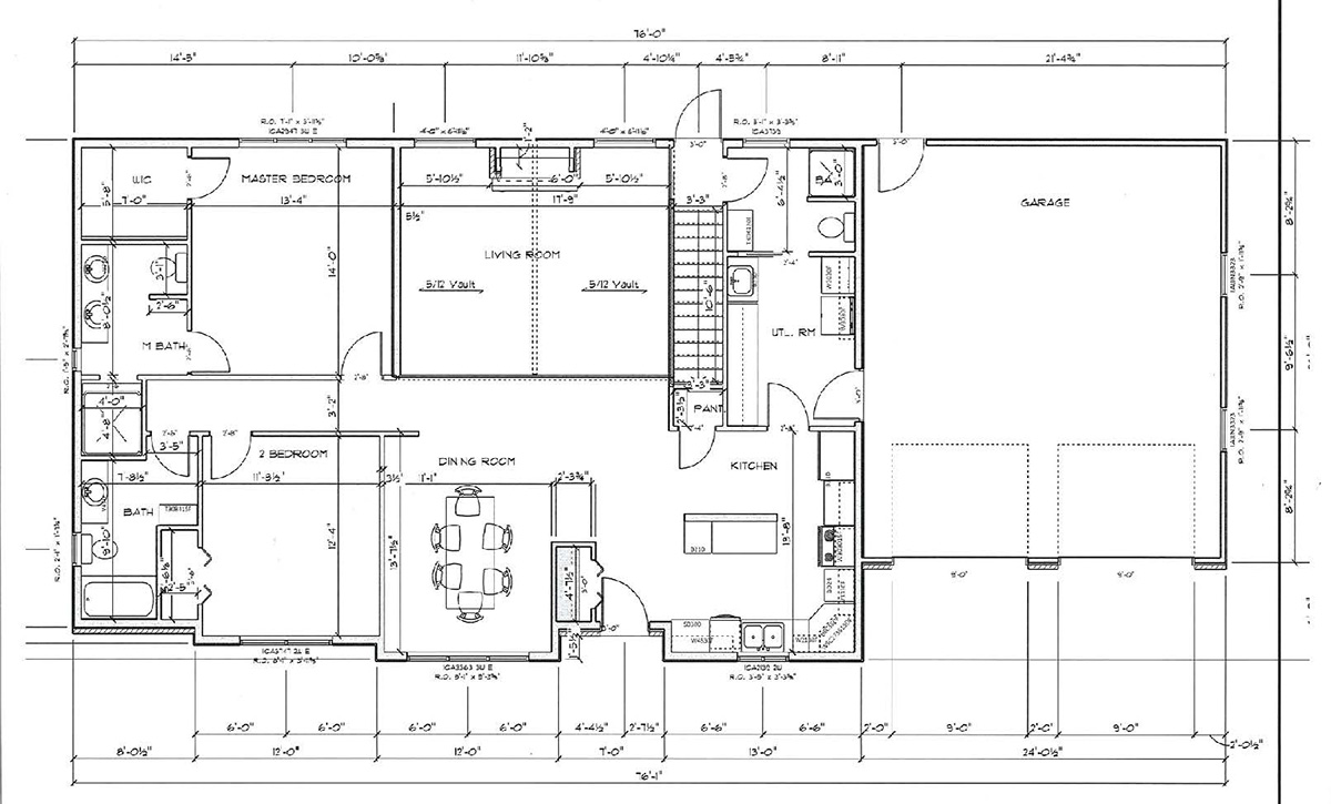 Black-and-white floor plan showing a single-story home layout with two bedrooms, two bathrooms, kitchen, dining room, living room, and attached two-car garage.