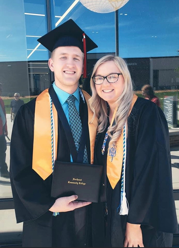 Jared and Grace Bessmer in graduation cap and gown