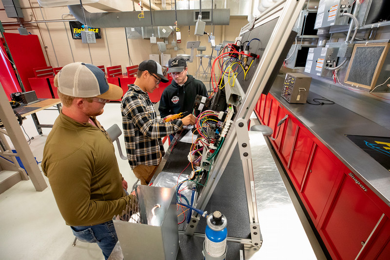 HVAC students at Northeast Community College participate in hands-on lab instruction, reflecting the college’s focus on workforce-aligned training during Community College Month.